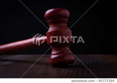 Judge's Hammer. Sentencing. Trial of people. Courtroom. Judge's Hammer. Sentencing. Trial of people. Courtroom. 95777284