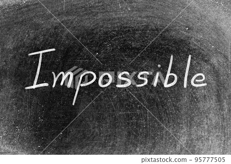 White chalk hand writing in word impossible on blackboard background 95777505