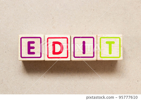 Color letter block in word edit on wood background 95777610