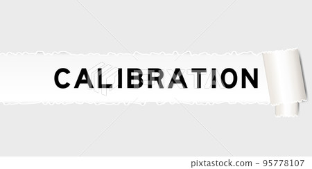 Ripped gray paper background that have word calibration under torn part Ripped gray paper background that have word calibration under torn part 95778107