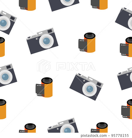 Photographic film in a reel and a camera on a white background. 95778155