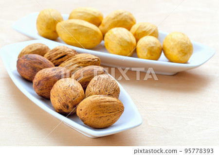 two plates with large nuts two plates with large nuts 95778393