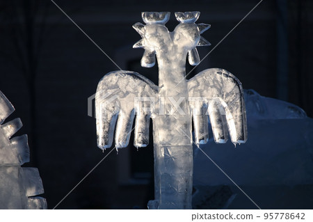 ice figure of a bird in the sun. ice figure of a bird in the sun. 95778642