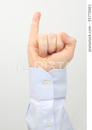 Male hand with raised little finger on a white background Male hand with raised little finger on a white background 95778861