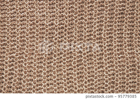 Handmade knit background with macro wool threads. Handmade knit background with macro wool threads. 95779385