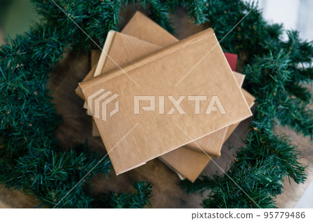 Book or handmade notebook at the chtistmas tree 95779486