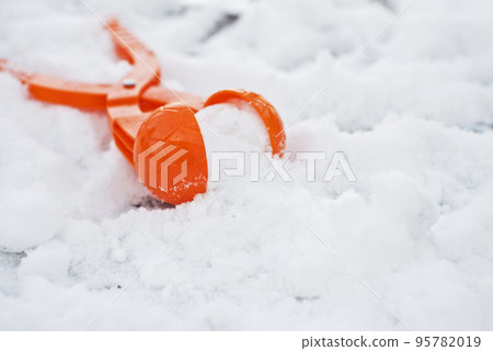 A tool for making snowballs from snow for childrens winter games A tool for making snowballs from snow for childrens winter games 95782019