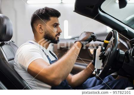 Car detailing and interior care concept. Car detailing and interior care concept. 95782101