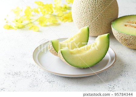 Earl's melon sliced Earl's melon sliced 95784344