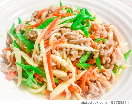 Chinese home-cooked dish, 茭白三絲 (Chinese stir-fried rice cake and colorful vegetables) Chinese home-cooked dish, 茭白三絲 (Chinese stir-fried rice cake and colorful vegetables) 95785224