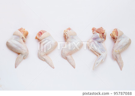 Fresh raw chicken wings on white background. Fresh raw chicken wings on white background. 95787088