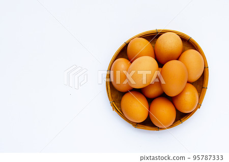 Fresh eggs on white background. Copy space 95787333