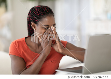 Eyes Fatigue. Young Black Woman Feeling Tired After Using Laptop At Home 95787543