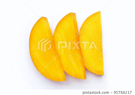 Mango fruit slices on white background. Mango fruit slices on white background. 95788217