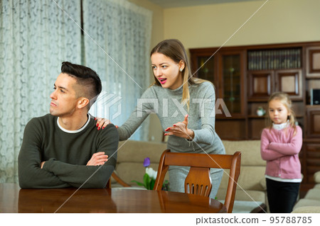 Family of three with teenager boy having quarrel at home 95788785