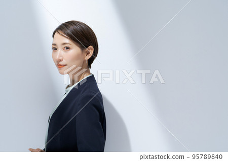Woman in a suit Woman in a suit 95789840