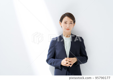 Woman in a suit 95790177
