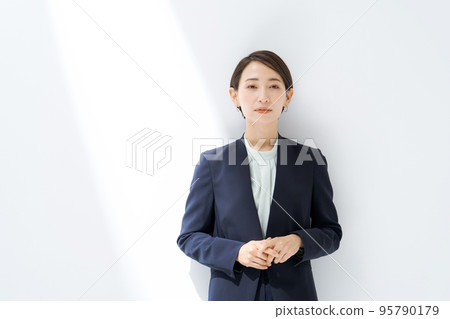 Woman in a suit Woman in a suit 95790179