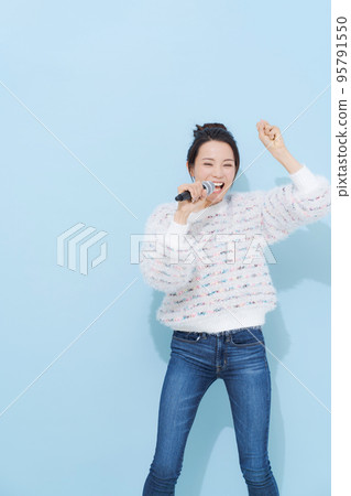 woman enjoying singing woman enjoying singing 95791550