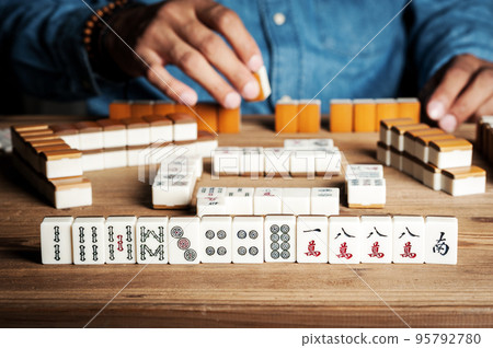 Playing Mahjong game Playing Mahjong game 95792780