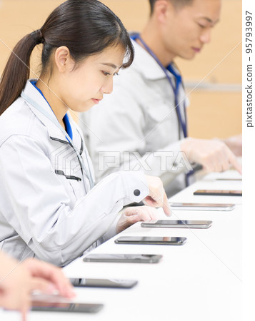 Smartphone kitting staff smartphone kitting setup business image 95793997
