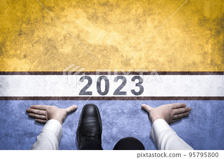 2023 Year Concept. Top View of Businessman Steps Forward to New Year Challenge. Businessman on way road leading forward to happy new year celebration in beginning of 2023 for successful start 95795800