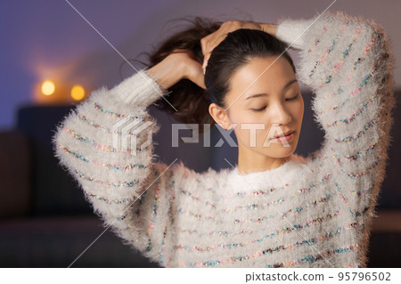 A woman relaxing at home beauty A woman relaxing at home beauty 95796502