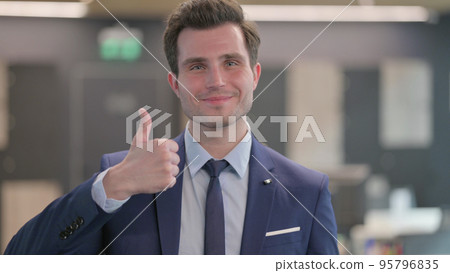 Portrait of Businessman showing Thumbs Up Sign 95796835
