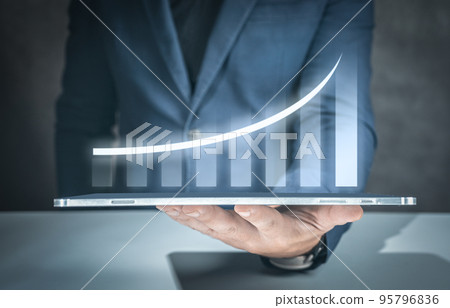 Businessman with report chart up forward to financial profit growth of stock market investment. Development and growth concept. Businessman plan growth and increase of positive indicators in business. 95796836