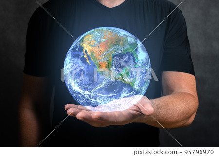 Man holds in his hand hologram of planet earth. man hold virtual hologram planet earth on hand. Concept of communication network, internet of things and future life Man holds in his hand hologram of planet earth. man hold virtual hologram planet earth on hand. Concept of communication network, internet of things and future life 95796970