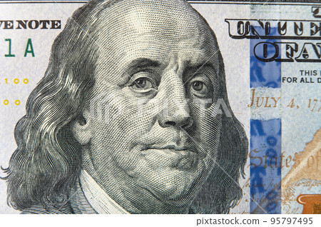 Benjamin Franklin's face on the US 100 dollar bill. Franklin on one hundred dollar bill. Detail of Portrait on One Hundred Dollar Bill Benjamin Franklin's face on the US 100 dollar bill. Franklin on one hundred dollar bill. Detail of Portrait on One Hundred Dollar Bill 95797495