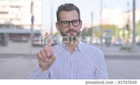 Rejecting Young Adult Man in Denial Standing Outdoor 95797609