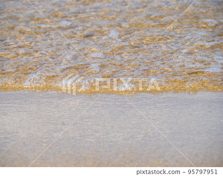 Calm sea shoreline and sandy beach. Calm sea shoreline and sandy beach. 95797951