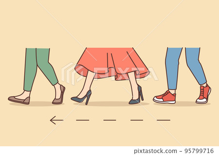 People legs walking in one direction People legs walking in one direction 95799716