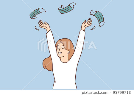 Smiling woman throwing face masks excited about pandemic end Smiling woman throwing face masks excited about pandemic end 95799718