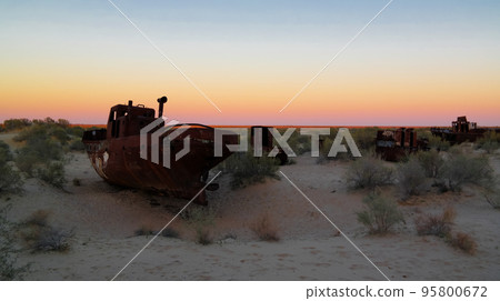 Panorama of ship cemetery at sunset near Moynaq, Karakalpakstan, Uzbekistan Panorama of ship cemetery at sunset near Moynaq, Karakalpakstan, Uzbekistan 95800672