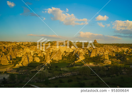 Sunset panoramic view to Goreme city, Cappadocia, Turkey Sunset panoramic view to Goreme city, Cappadocia, Turkey 95800684