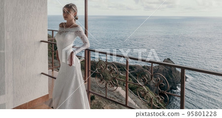 Romantic bride, blond girl in white wedding dress with open shou Romantic bride, blond girl in white wedding dress with open shou 95801228