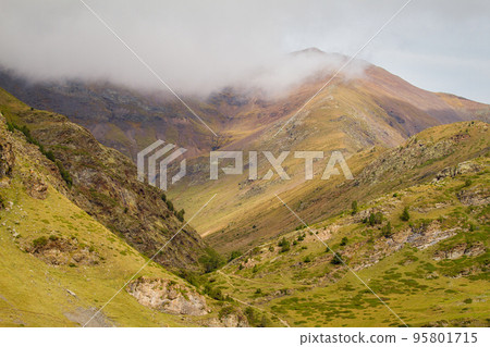 Cloudy day in a Spanish Pyrenees mountain, near Vall de Nuria valley 95801715