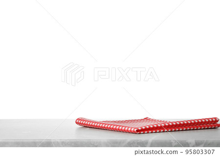 Folded kitchen towel on grey table. Space for design Folded kitchen towel on grey table. Space for design 95803307