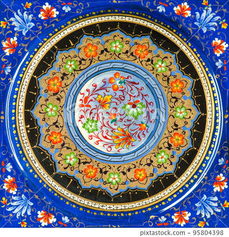 A closeup of a casket with an artistic painting. Central Asia, Uzbekistan A closeup of a casket with an artistic painting. Central Asia, Uzbekistan 95804398