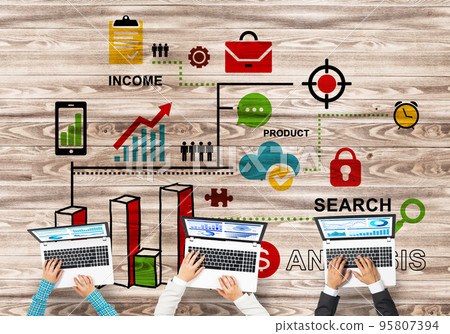 Top view of businesspeople sitting at table and using gadgets Top view of businesspeople sitting at table and using gadgets 95807394