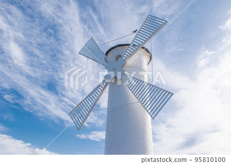 Old windmill lighthouse in Swinoujscie, a port in Poland on the Baltic Sea. 95810100