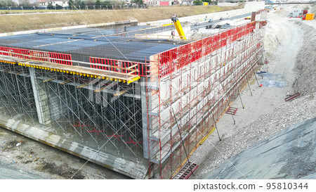 Highway construction site view. Civil engineering Highway construction site view. Civil engineering 95810344