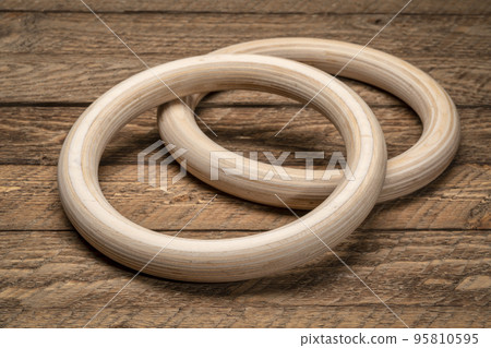 pair of wooden gymnastic rings 95810595