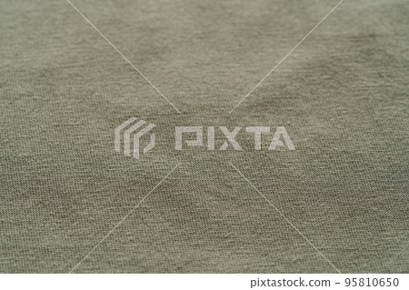 closeup shot of green premium cotton fabric closeup shot of green premium cotton fabric 95810650