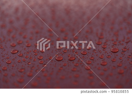 Water drops on a hydrophobic car paint surface 95810855
