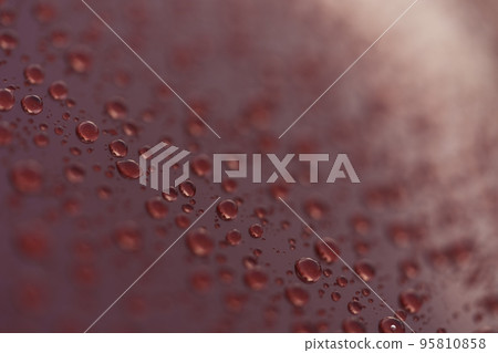 Water drops on a hydrophobic car paint surface Water drops on a hydrophobic car paint surface 95810858