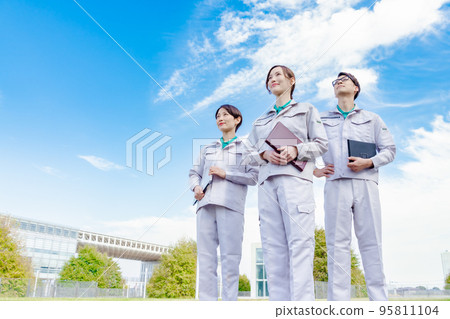 Engineer team in work clothes Engineer team in work clothes 95811104