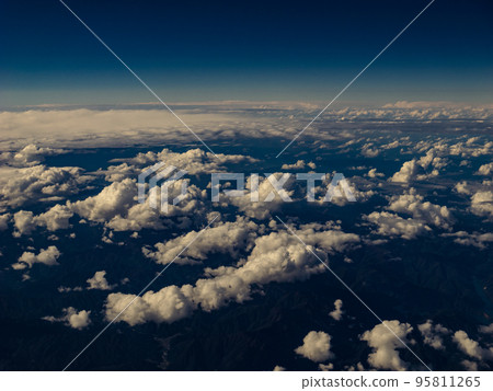 [Travel] Sky and clouds seen from an airplane above 95811265